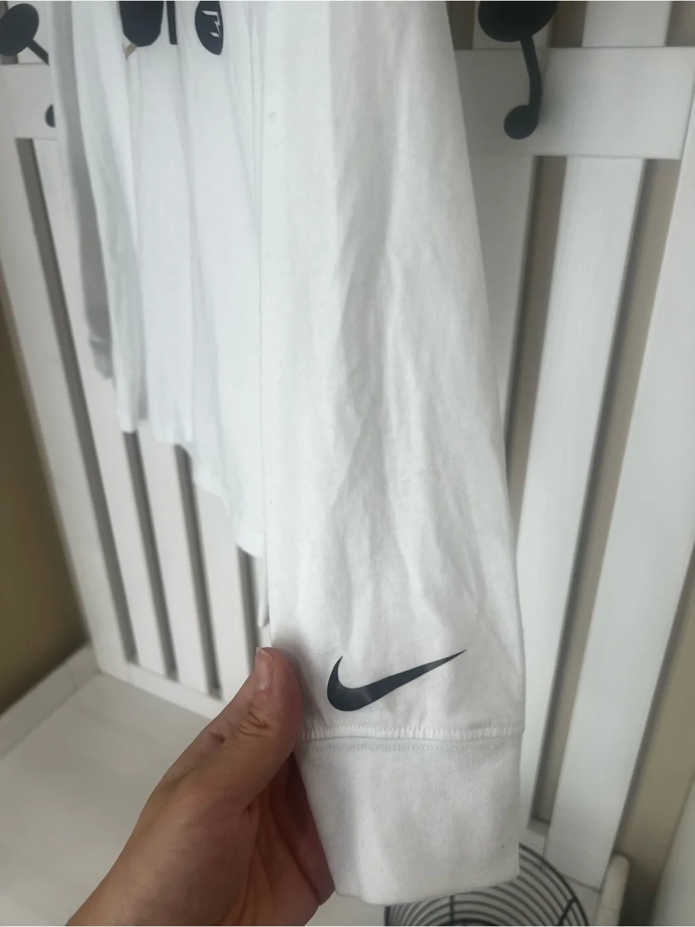 Nike Kids White Long Sleeve Tee with Black & Gold Drip Graphic